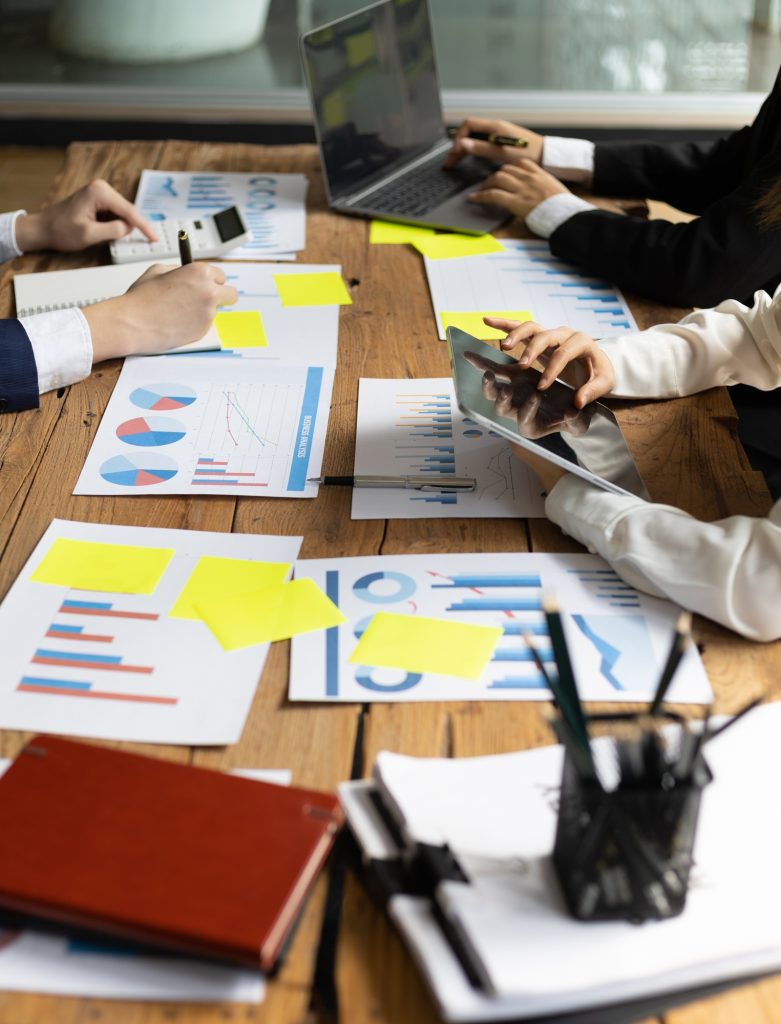 Business meeting, colleagues brainstorm together, discuss business project planning.