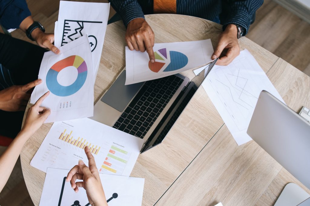 Busy Business Hands with Paperwork